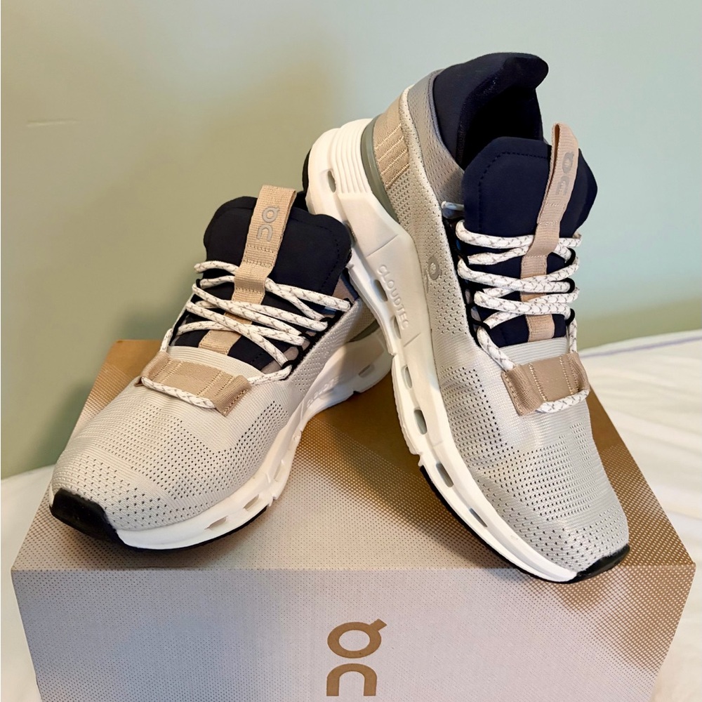 On Running Beige and Black Athletic Shoes